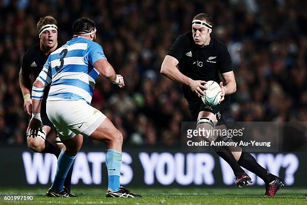 Brodie Retallick of New Zealand makes a run at Ramiro Herrera of Argentina during the Rugby Championship match between the New Zealand All Blacks and...