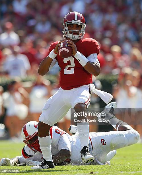 Jalen Hurts of the Alabama Crimson Tide looks to pass against the Western Kentucky Hilltoppers at Bryant-Denny Stadium on September 10, 2016 in...