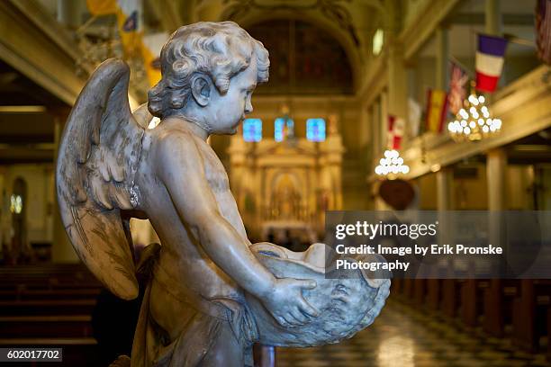 angel statue, saint louis cathedral - st louis cathedral new orleans 個照片及圖片檔