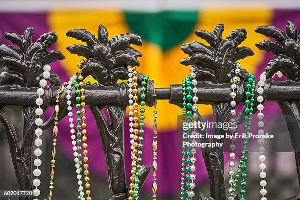 mardi gras beads and color - new orleans mardi gras stock pictures, royalty-free photos & images