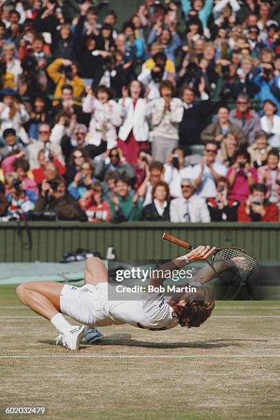 Stefan Edberg of Sweden celebrates defeating Boris Becker in the Men's Singles Final of the Wimbledon Lawn Tennis Championship on 4 July 1988 at the...