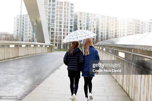 teenage friends - girl shower stock-fotos und bilder