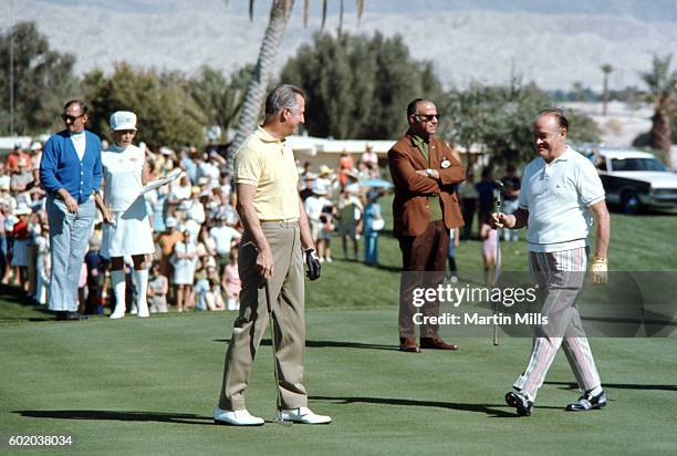 Entertainer Bob Hope plays golf with Vice President Spiro Agnew during the Bob Hope Desert Golf Classic on February 13, 1971 in Palm Springs,...