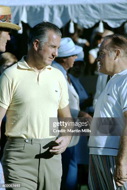 Vice President Spiro Agnew talks with entertainer Bob Hope during the Bob Hope Desert Golf Classic on February 13, 1971 in Palm Springs, California.