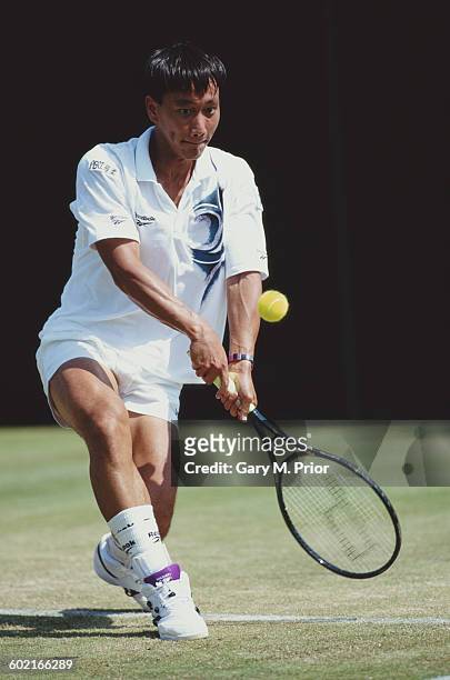 Michael Chang of the United States makes a double handed forehand return to Grant Connell during their Men's Singles third round match at the...