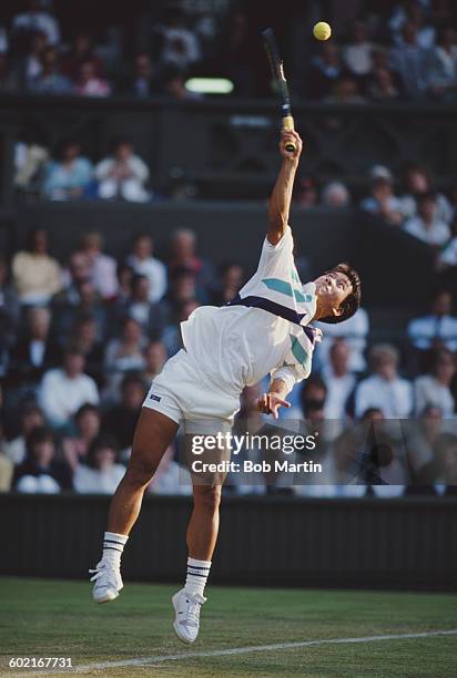 Michael Chang of the United States serves to Henri Leconte during their Men's Singles second round match at the Wimbledon Lawn Tennis Championship on...