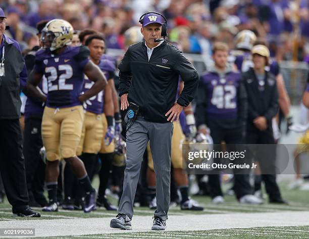 Head coach Chris Petersen of the Washington Huskies looks on against the Rutgers Scarlet Knights on September 3, 2016 at Husky Stadium in Seattle,...