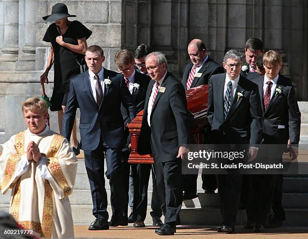 Mourners carry the casket after Phyllis Schlafly's funeral at the Cathedral Basilica of St. Louis on Saturday, Sept. 10, 2016.