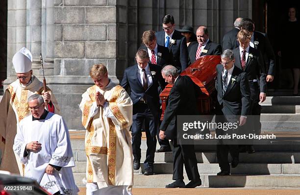 Mourners carry the casket after Phyllis Schlafly's funeral at the Cathedral Basilica of St. Louis on Saturday, Sept. 10, 2016.