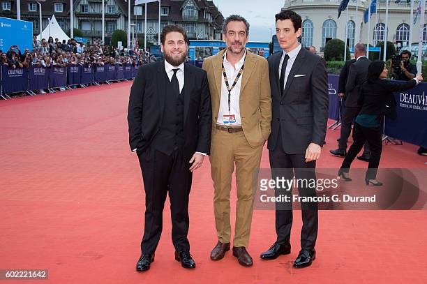Jonah Hill, Todd Phillips and Miles Teller arrive to the "War Dogs" premiere and Award Ceremony during the 42nd Deauville American Film Festival on...