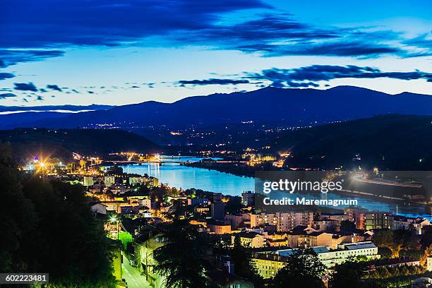 the town and the river rhone - rhone river stock pictures, royalty-free photos & images