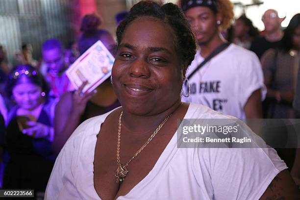 Guest attends the 2016 Essence Street Style Block Party - Show at DUMBO on September 10, 2016 in Brooklyn Borough of New York City.