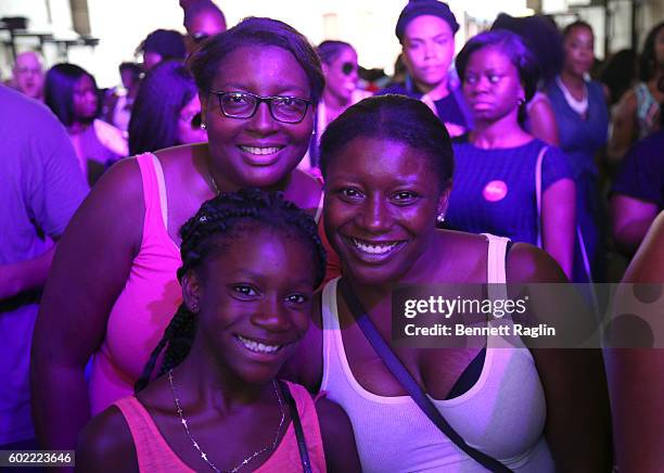 Guests attend the 2016 Essence Street Style Block Party - Show at DUMBO on September 10, 2016 in Brooklyn Borough of New York City.