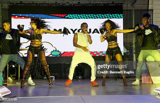 Singer Ayo Jay performs on stage during the 2016 Essence Street Style Block Party at DUMBO on September 10, 2016 in Brooklyn Borough of New York City.