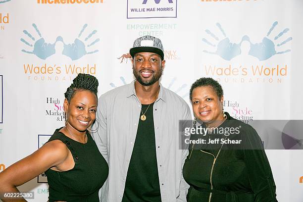 Tragil Wade, Dwyane Wade, and Pastor Jolinda Wade attend Nickelodeon's Road To Worldwide Day of Play With Dwyane Wade at Willie Mae Morris...