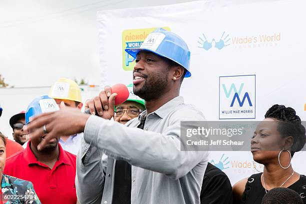 Dwyane Wade and Tragil Wade attend Nickelodeon's Road To Worldwide Day of Play With Dwyane Wade at Willie Mae Morris Empowerment Center on September...