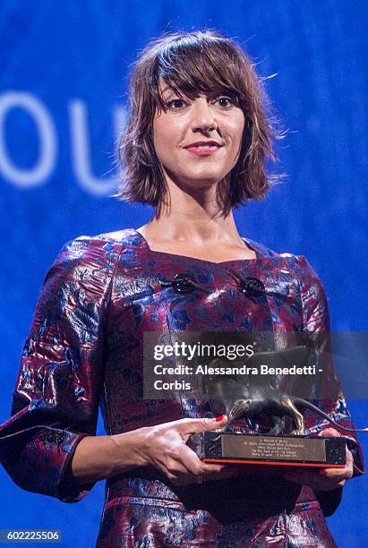 Director Ana Lily Amirpour receives the Special Jury Prize for 'The Bad Batch' during the closing ceremony of the 73rd Venice Film Festival at Sala...