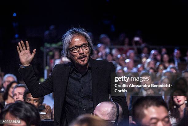 Director Lav Diaz reacts as he is awarded with the Golden Lion for Best Film for 'The Woman who Left - Ang Babaeng Humayo' during the closing...