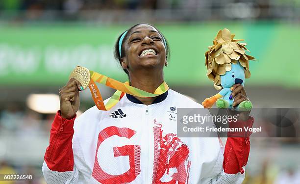 Kadeena Cox of Great Britain celebrates on the podium after winning Women's C4-5 500m Time Trial track cycling on day 3 of the Rio 2016 Paralympic...