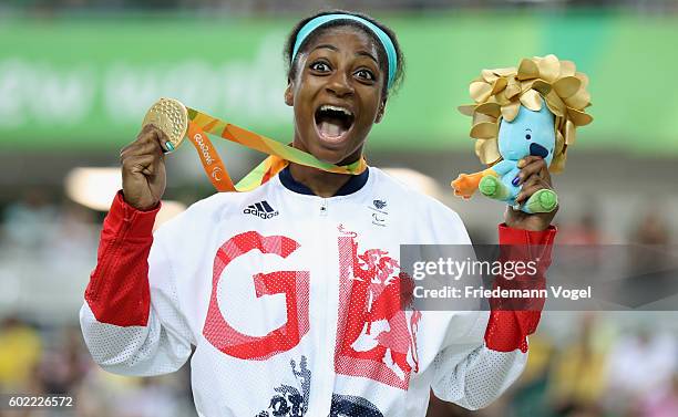 Kadeena Cox of Great Britain celebrates on the podium after winning Women's C4-5 500m Time Trial track cycling on day 3 of the Rio 2016 Paralympic...