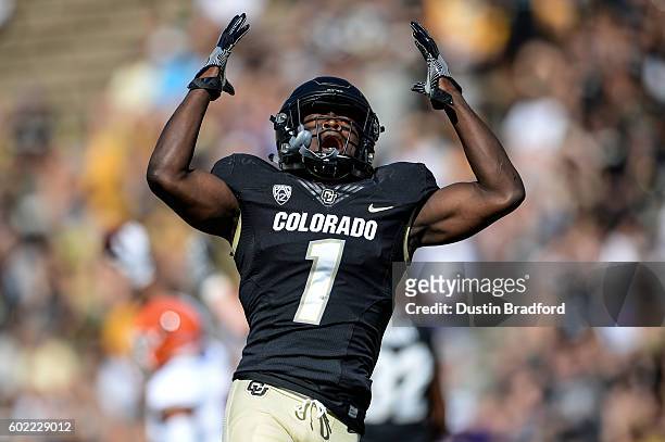 Defensive back Afolabi Laguda of the Colorado Buffaloes throw his hands in the air in frustration after nearly interception a pass against the Idaho...