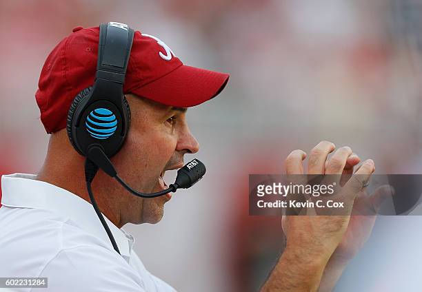 Jeremy Pruitt, defensive coordinator of the Alabama Crimson Tide, looks on from the sidelines against the Western Kentucky Hilltoppers at...