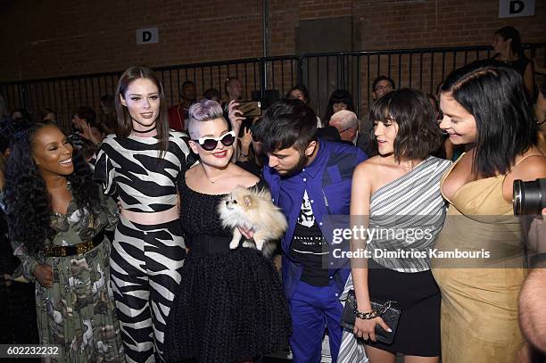 June Ambrose, Coco Rocha, Kelly Osbourne, Brad Walsh, Isabelle Fuhrman, and Leigh Lezark attend the Christian Siriano fashion show during New York...