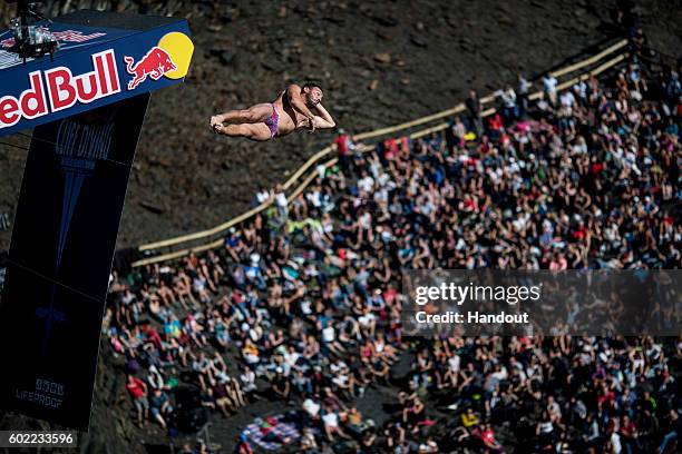 In this handout image provided by Red Bull, Blake Aldridge of the UK dives from the 27.5 metre platform at the Blue Lagoon during the sixth stop of...