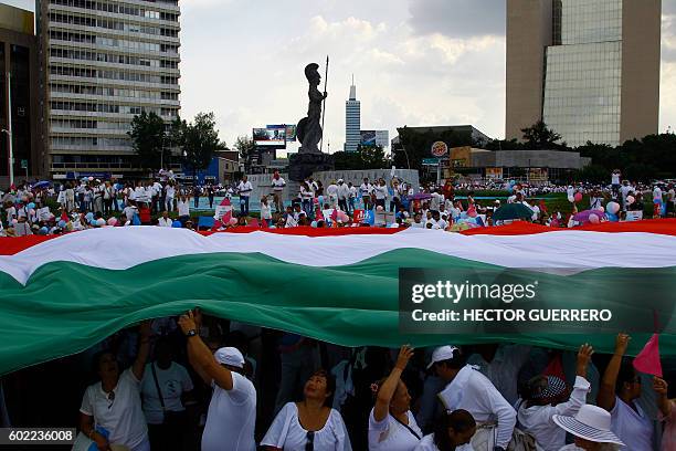 Catholic activists march to protest against President Enrique Pena Nieto proposal to legalize same-sex marriage, in Guadalajara, Mexico, on September...