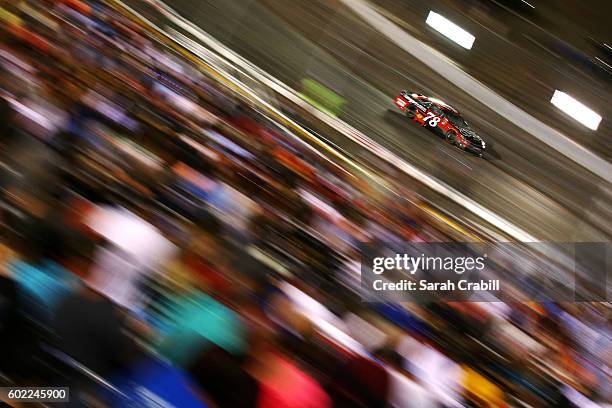 Martin Truex Jr. Drives the Tanger Outlets Toyota during the NASCAR Sprint Cup Series Federated Auto Parts 400 at Richmond International Raceway on...