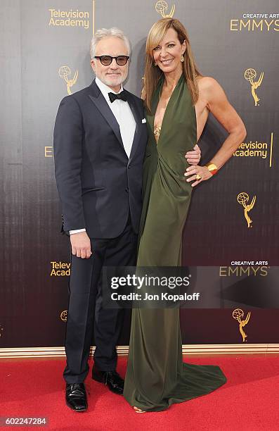 Actor Bradley Whitford and actress Allison Janney arrive at the 2016 Creative Arts Emmy Awards at Microsoft Theater on September 10, 2016 in Los...