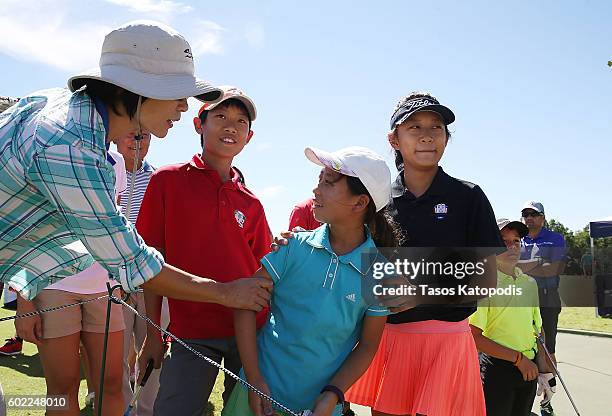 Treed Huang and his sister Maye Huang want the live scoring in the girls 7-9 at the Drive, Chip and Putt Regional Qualifier at Southern Hills Country...