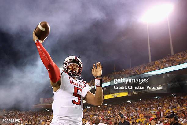 Quarterback Patrick Mahomes II of the Texas Tech Red Raiders warms up before the start of the college football game against the Arizona State Sun...