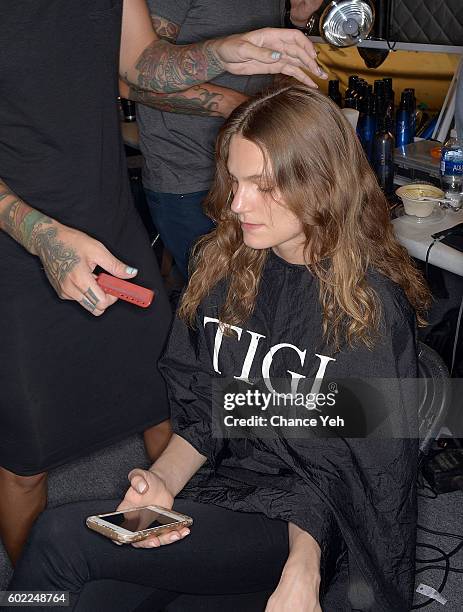 Model is seen backstage getting hair prepared for the Jonathan Simkhai show during September 2016 MADE Fashion Week at The Arc, Skylight at Moynihan...