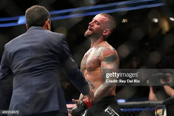 Punk reacts to his loss to Mickey Gall during the UFC 203 event at Quicken Loans Arena on September 10, 2016 in Cleveland, Ohio.