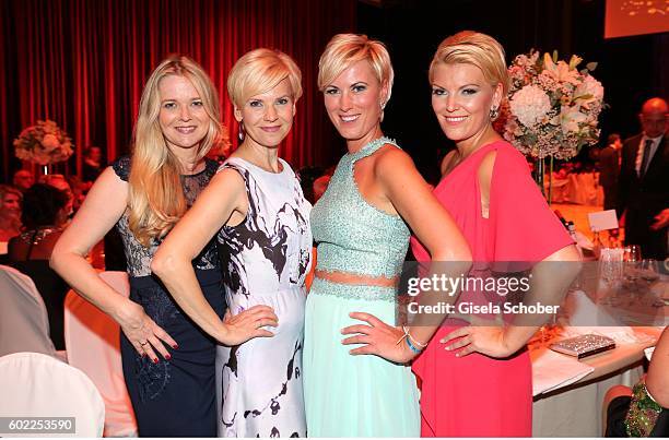 Andrea Kathrin Loewig and her sister Kerstin Ohlemann and Kamilla Senjo and her sister Juliana Senjo during the Leipzig Opera Ball 'Let's dance...