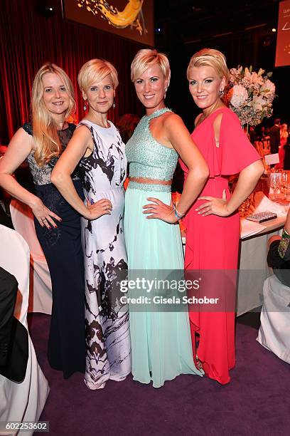 Andrea Kathrin Loewig and her sister Kerstin Ohlemann and Kamilla Senjo and her sister Juliana Senjo during the Leipzig Opera Ball 'Let's dance...