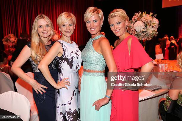 Andrea Kathrin Loewig and her sister Kerstin Ohlemann and Kamilla Senjo and her sister Juliana Senjo during the Leipzig Opera Ball 'Let's dance...