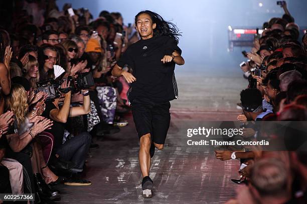 Alexander Wang greets the audience after presenting his Spring 2017 collection at The Arc, Skylight at Moynihan Station during New York Fashion Week...