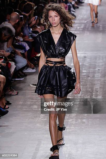 Model walks the runway at the Alexander Wang Spring 2017 fashion show during New York Fashion Week September 2016 at Pier 94 on September 10, 2016 in...