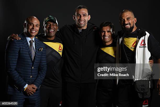 Fabricio Werdum of Brazil poses with his teammates for a post fight portrait backstage during the UFC 203 event at Quicken Loans Arena on September...