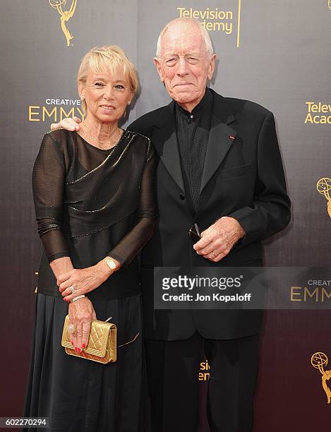 Actor Max von Sydow and wife Catherine Brelet arrive at the 2016 Creative Arts Emmy Awards at Microsoft Theater on September 10, 2016 in Los Angeles,...