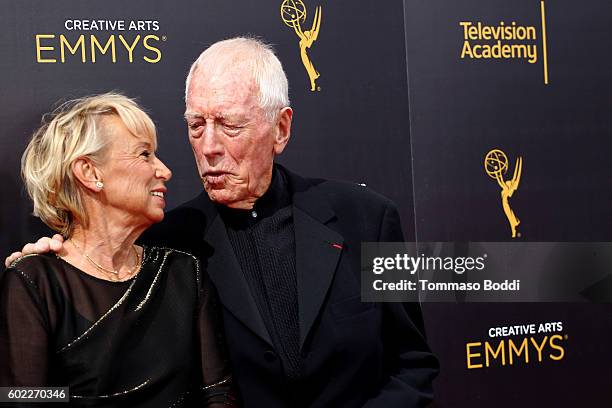 Max von Sydow and Catherine Brelet attend the 2016 Creative Arts Emmy Awards held at Microsoft Theater on September 10, 2016 in Los Angeles,...