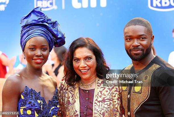 Lupita Nyong'o, Mira Nair and David Oyelowo arrive at the 2016 Toronto International Film Festival - "Queen Of Katwe" premiere held at Roy Thomson...