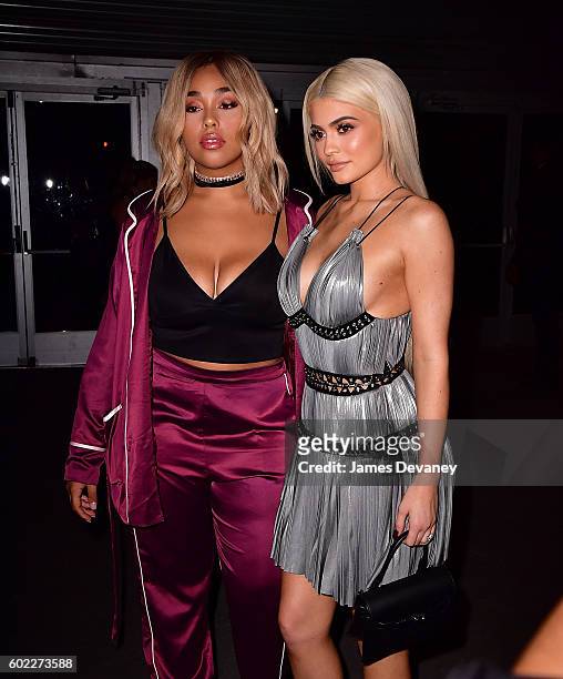 Jordyn Woods and Kylie Jenner attend the Alexander Wang show during New York Fashion Week at Pier 94 on September 10, 2016 in New York City.