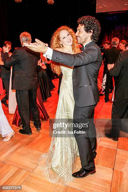 German actress Petra Bernhardt and Make up artist Boris Entrup dance during the Leipzig Opera Ball 2016 on September 10, 2016 in Leipzig, Germany.