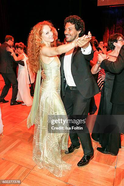 German actress Petra Bernhardt and Make up artist Boris Entrup dance during the Leipzig Opera Ball 2016 on September 10, 2016 in Leipzig, Germany.