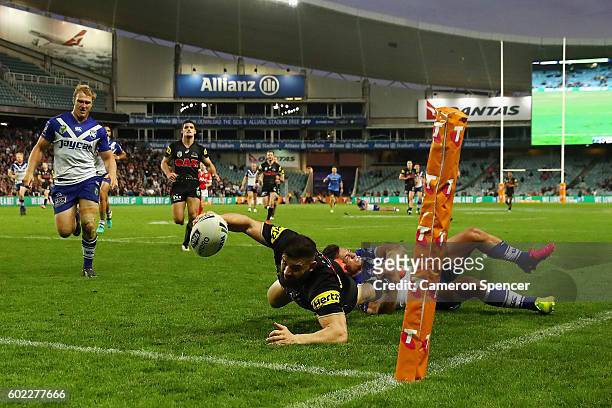 Josh Mansour of the Panthers scores a try during the NRL Elimination Final match between the Penrith Panthers and the Canterbury Bulldogs at Allianz...