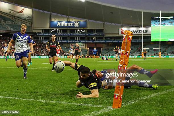 Josh Mansour of the Panthers scores a try during the NRL Elimination Final match between the Penrith Panthers and the Canterbury Bulldogs at Allianz...