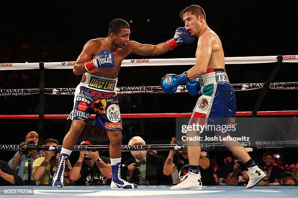 Carlos Cuadras of Mexico and Roman Gonzalez of Nicaragua in action during their WBC super flyweight title fight at The Forum on September 10, 2016 in...